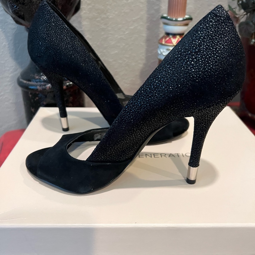 Beautiful Stiletto black suede with a sparkly finish and gold tip on heel